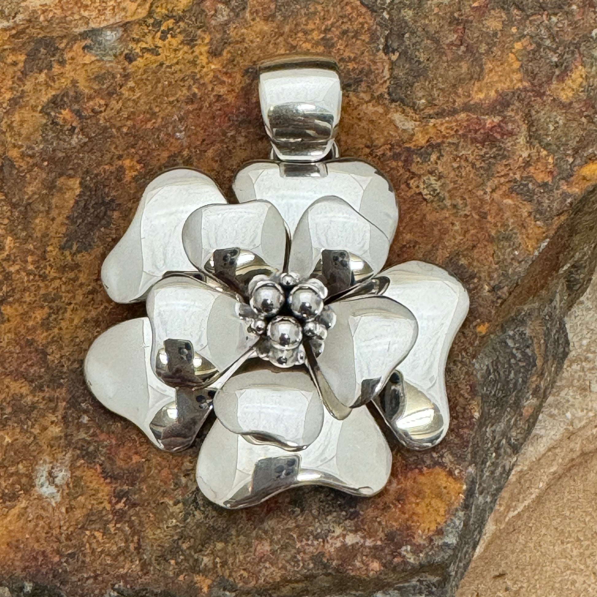 Sterling Silver Flower Pendant by Artie Yellowhorse