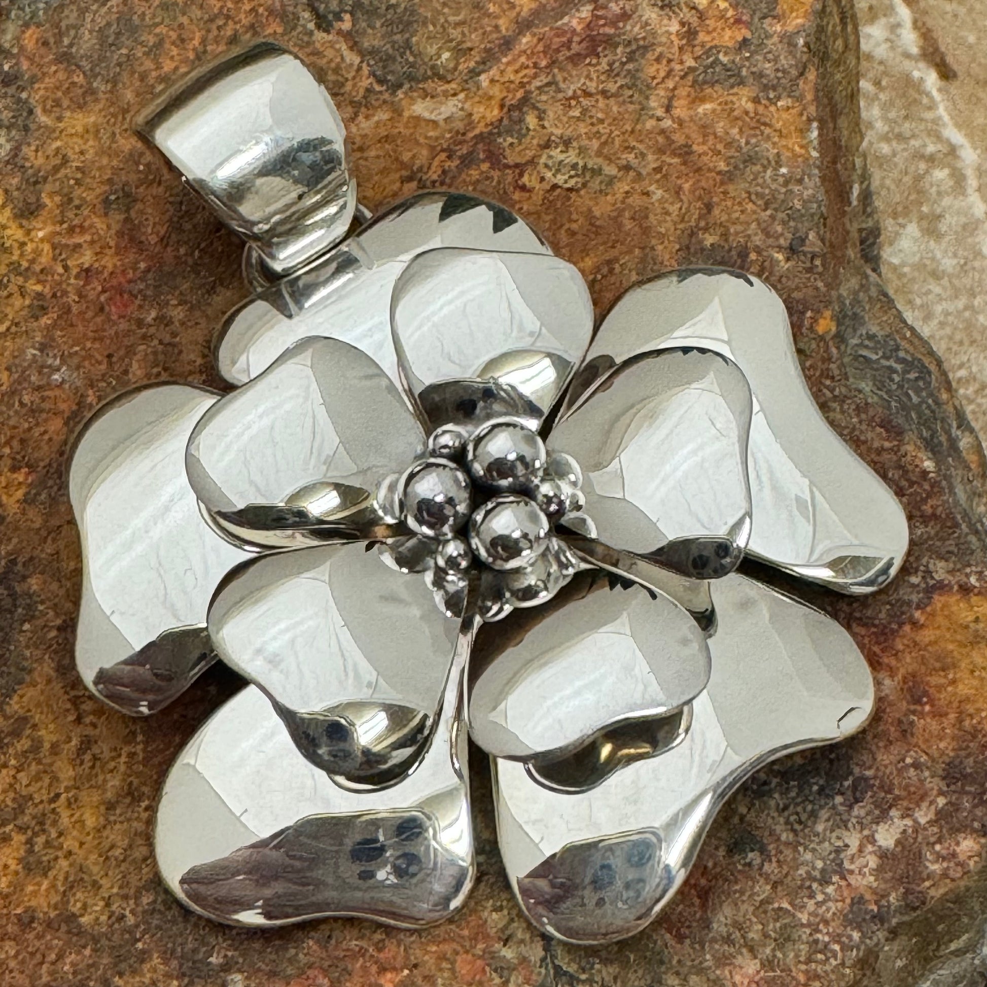 Sterling Silver Flower Pendant by Artie Yellowhorse