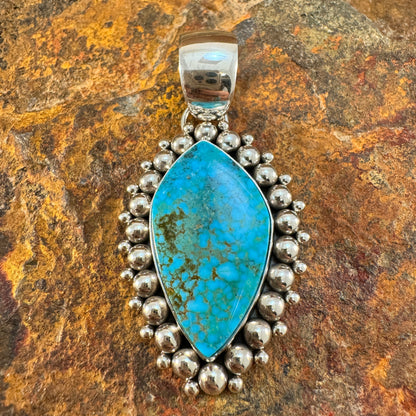 Kingman Turquoise Sterling Silver Dot Pendant by Artie Yellowhorse