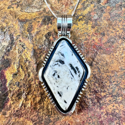 White Buffalo Sterling Silver Pendant by Wil Denetdale