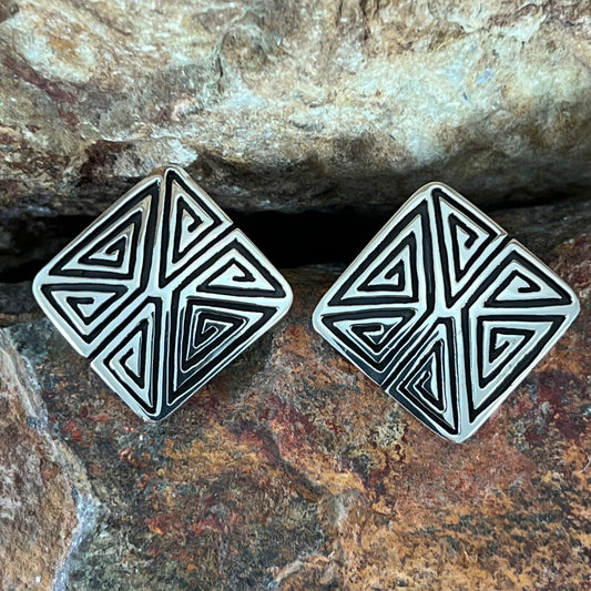 Traditional Sterling Silver Earrings by Elgin Tom