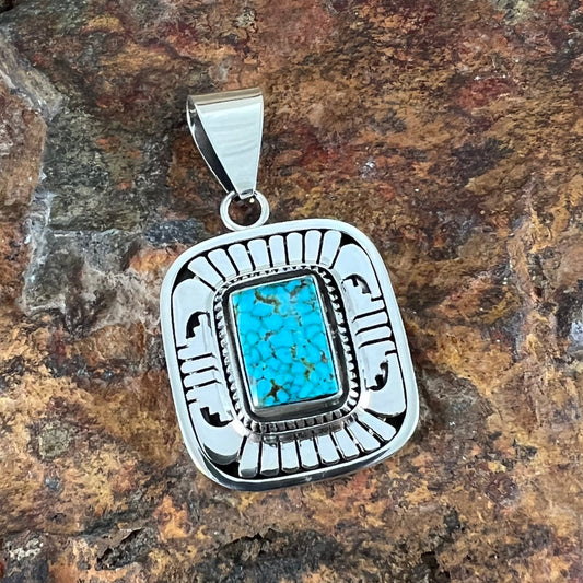 Kingman Turquoise Web Sterling Silver Pendant by Leonard Nez